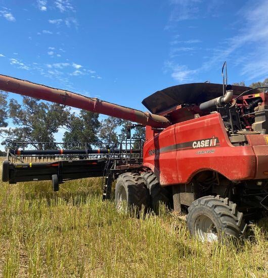 Bogged header in canola stubble